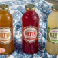 Pack degustación de botellas de kéfir artesanal Tierra Florida junto a tinturas madres, ideal para el bienestar natural.